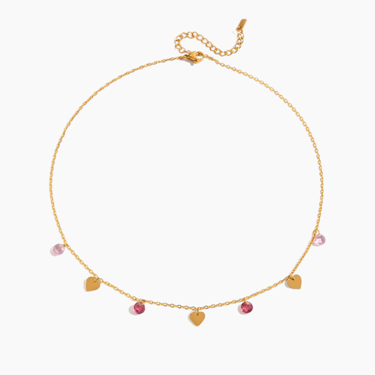 Gold necklace with heart-shaped pendants on a white background
