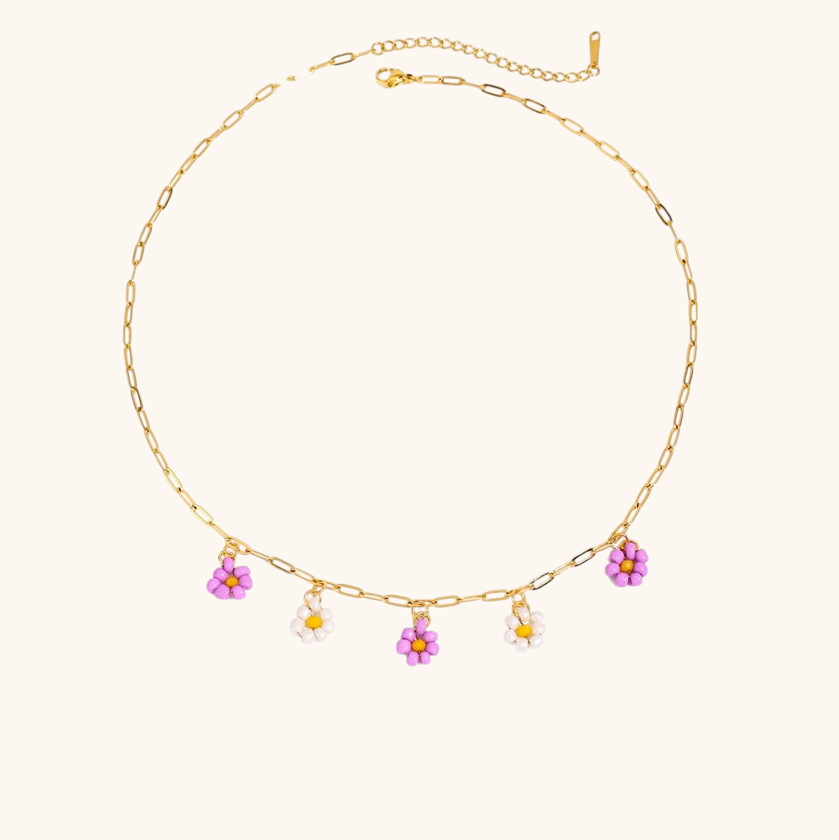 Minimalist purple and white beaded floral charm necklace on gold chain