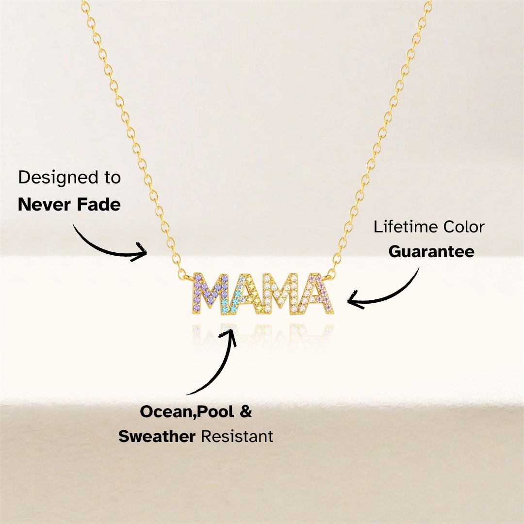 Colorful crystal MAMA necklace on gold chain, minimal background