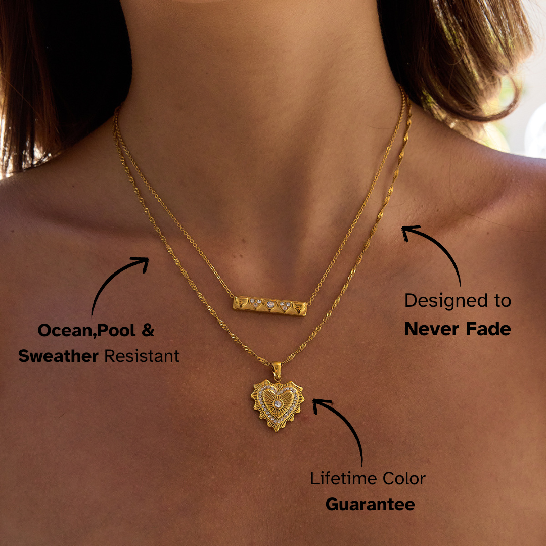 Golden necklace set with detailed heart pendant and dainty rectangular bar charm