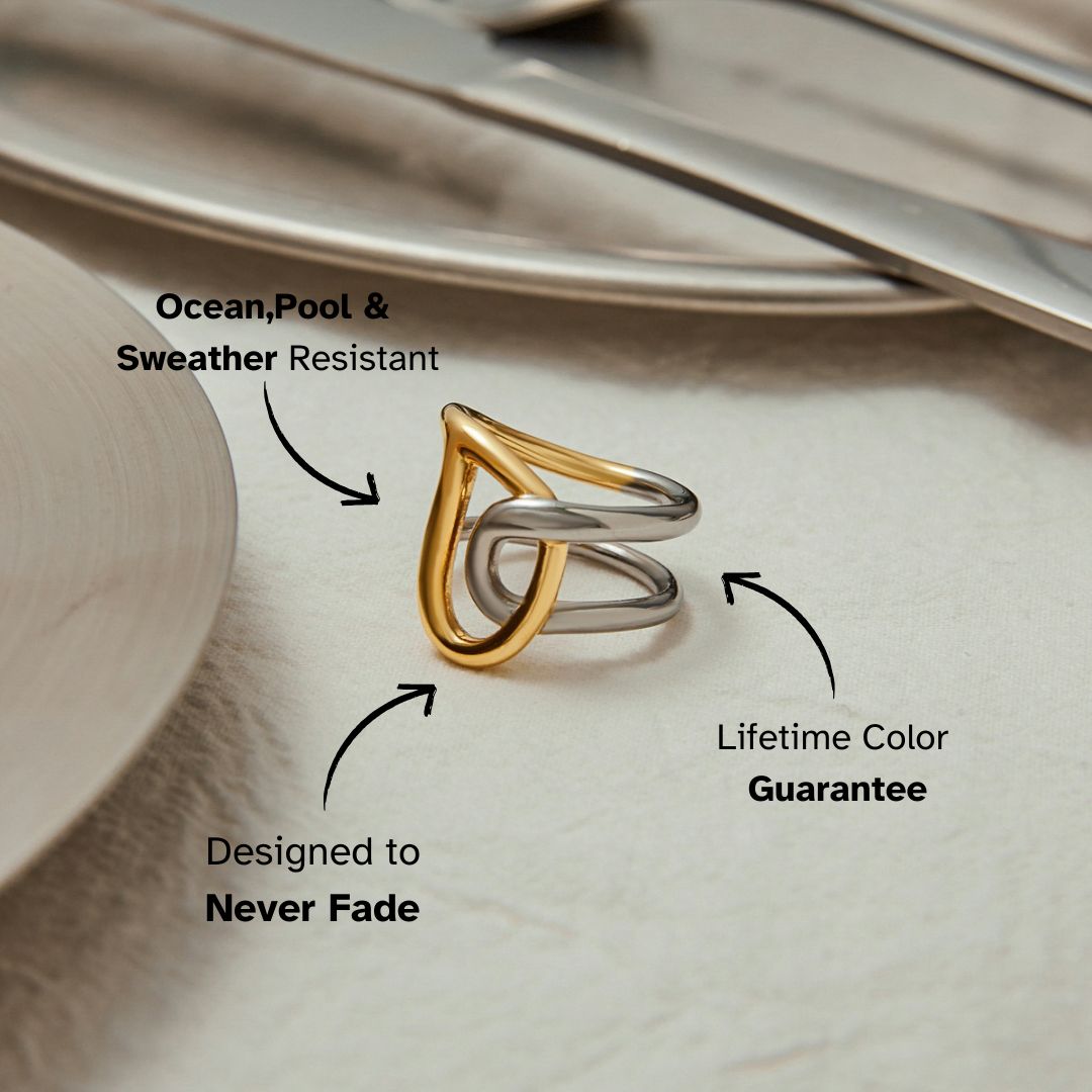 Gold and silver knot ring on plate, showcasing waterproof and fadeproof features