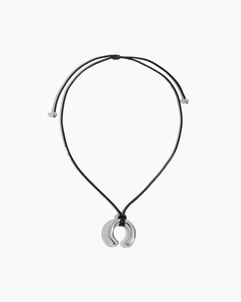 Necklace with a crescent moon pendant on a white background