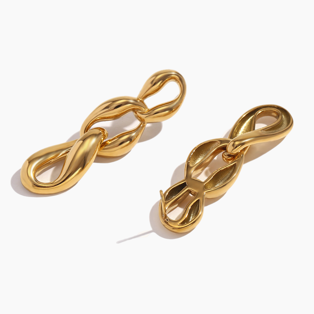 Gold chain-style earrings on a white background