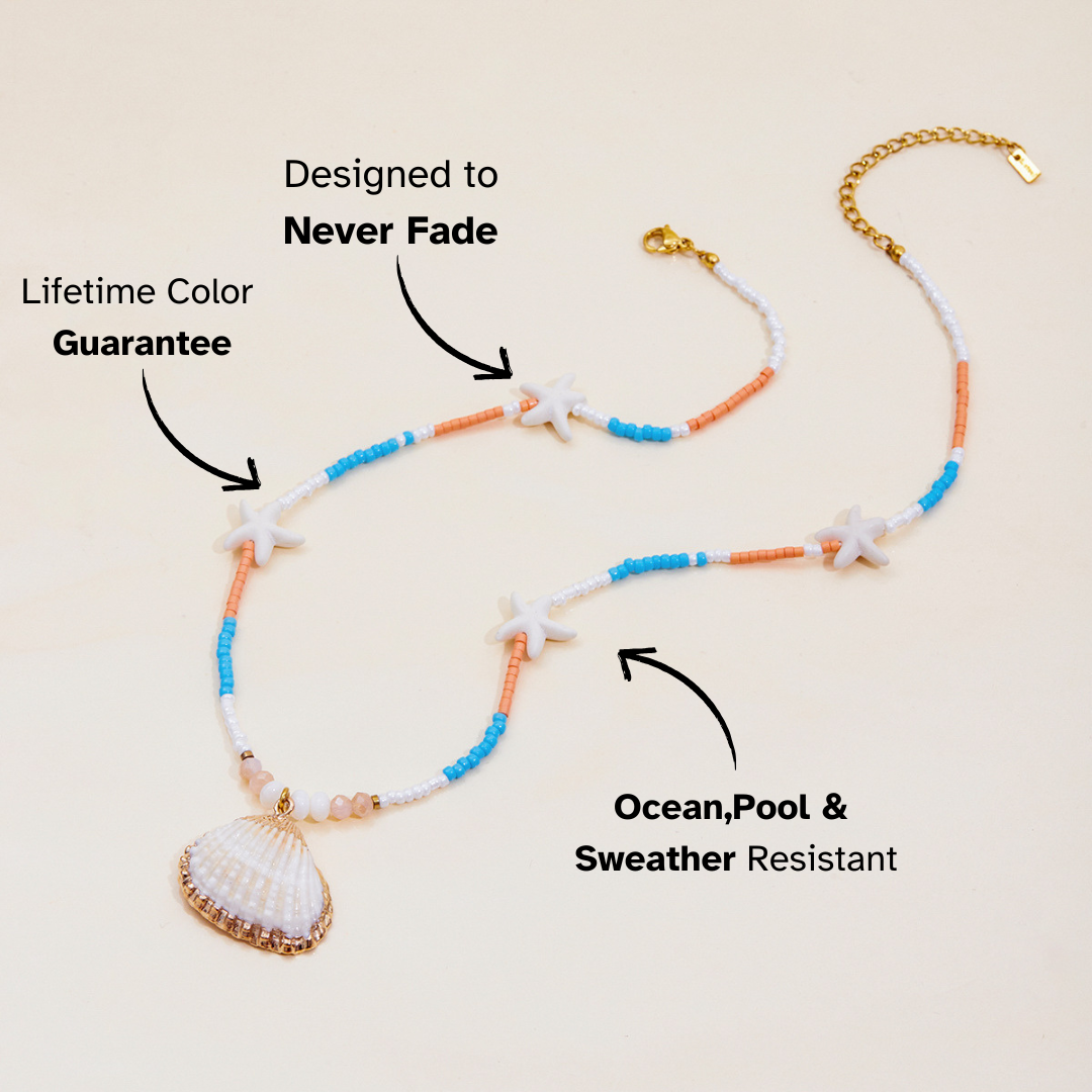 Ocean-inspired necklace with white starfish beads and gold seashell charm