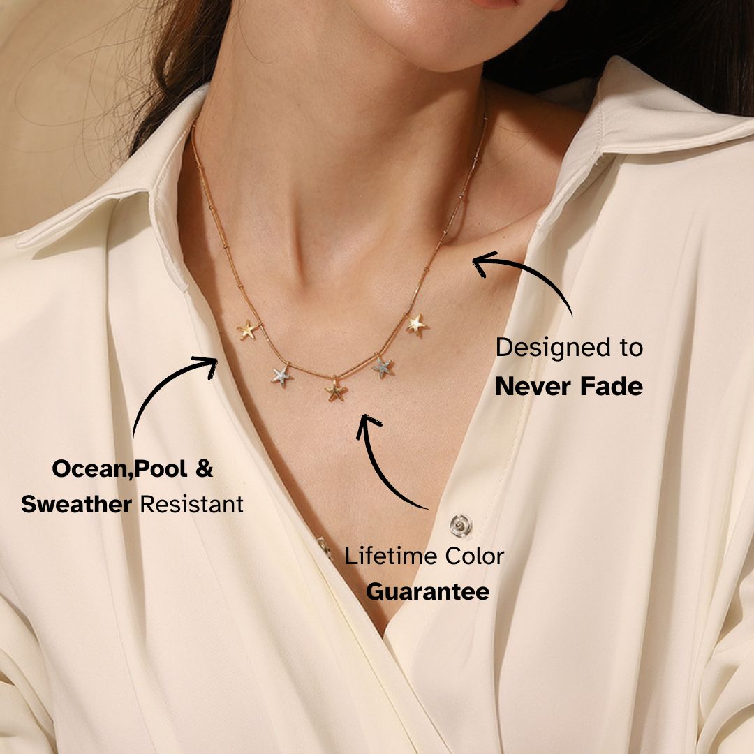 Model wearing star pendant necklace on beige blouse, perfect for poolside