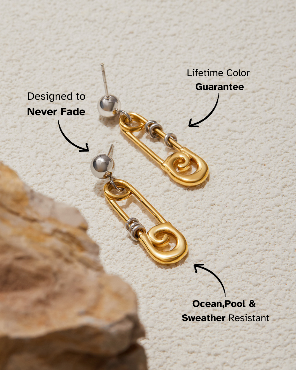 Gold and silver earrings on a textured beige background with text about color guarantee and resistance.