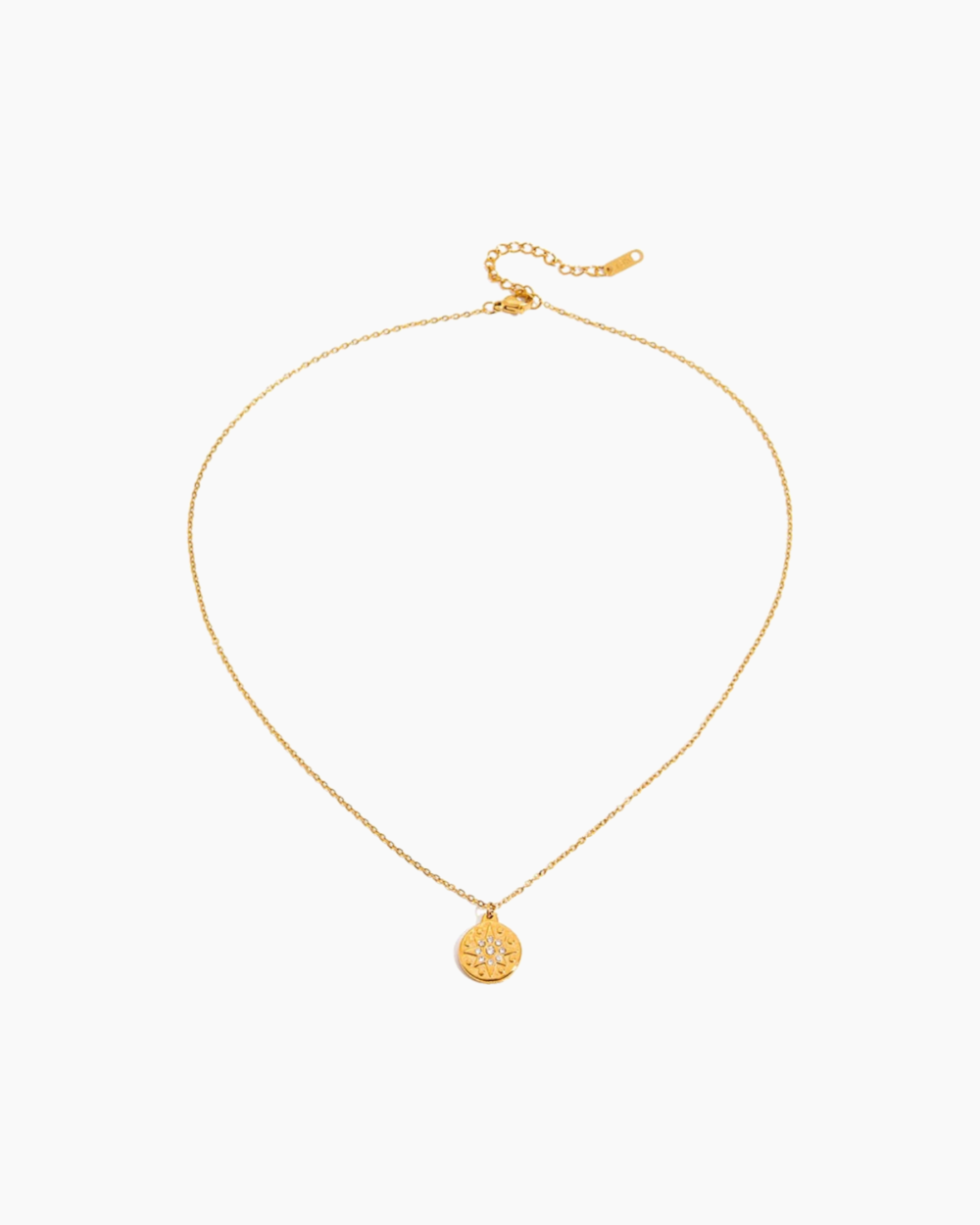 Gold necklace with a pendant on a white background