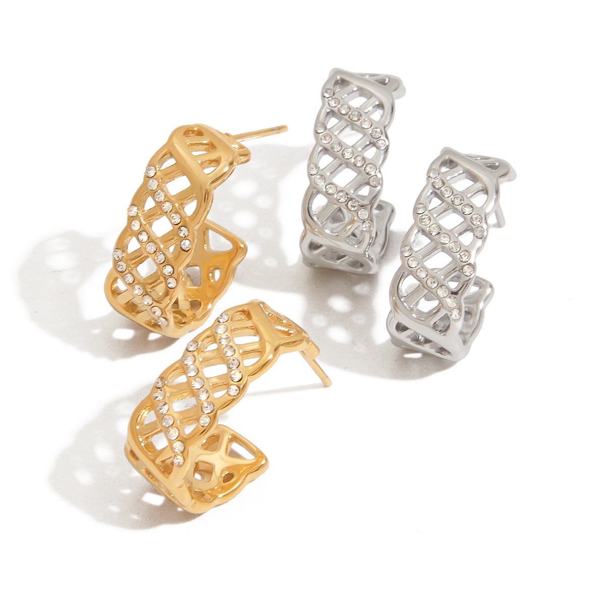 Dual color textured hoop earrings displayed on clean white background