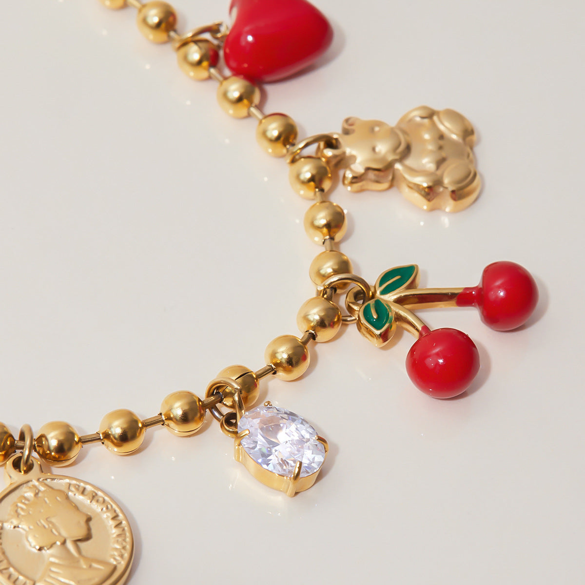 Ball chain necklace with red cherry pendant and waterproof design
