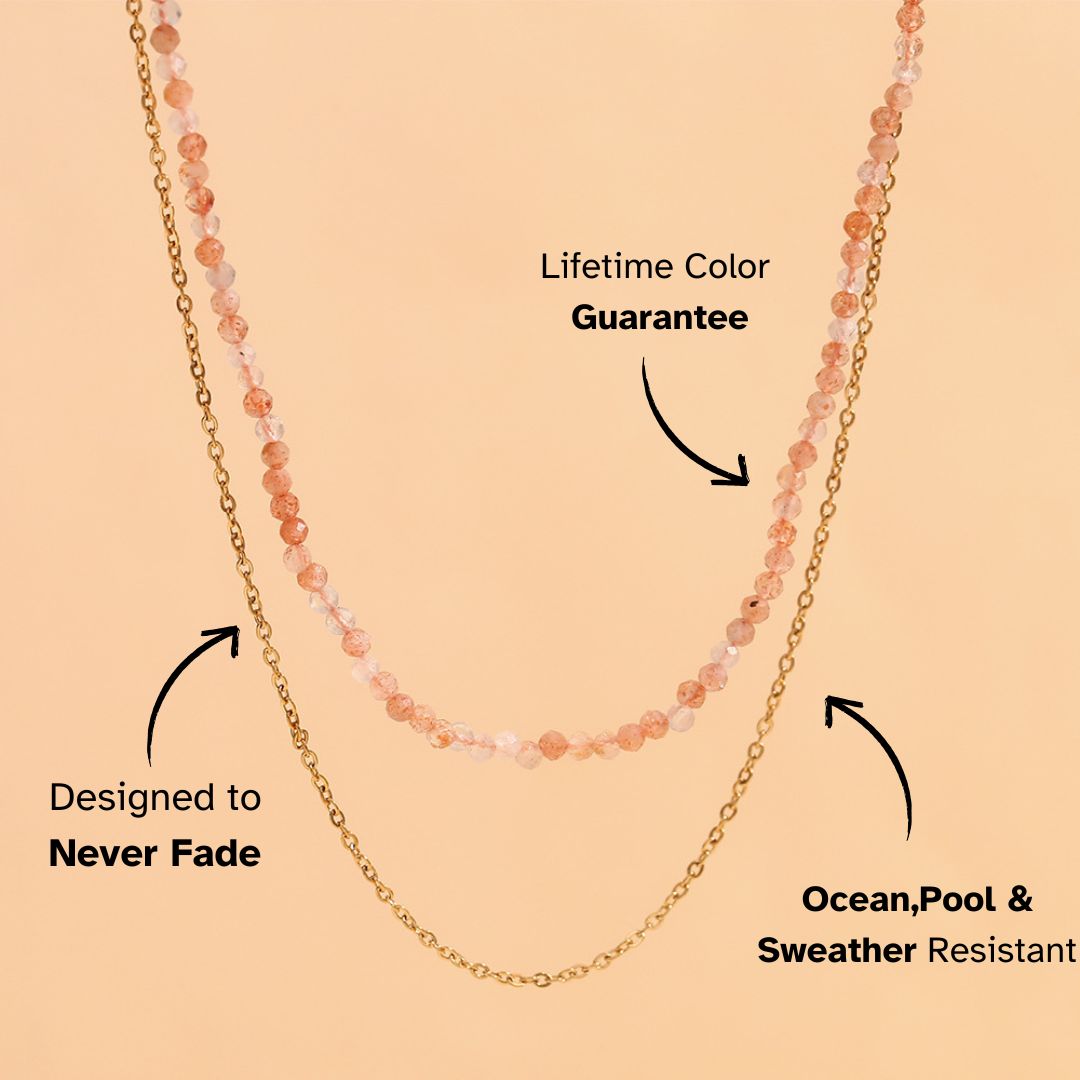 Double strand necklace with peach-toned crystal beads and gold chain, designed to never fade