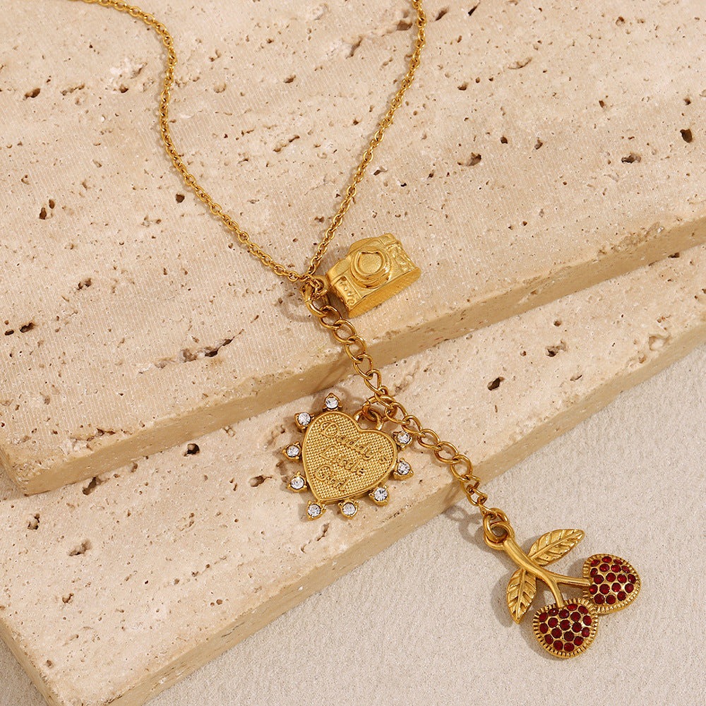 Y2K aesthetic necklace with red rhinestone cherry charm