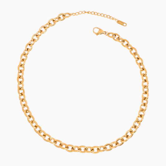 Gold chain necklace on a white background