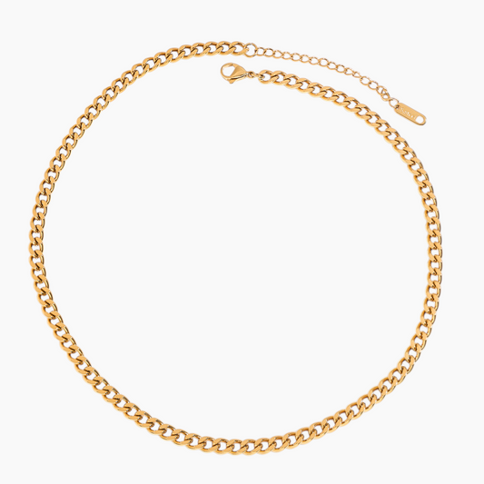 Gold chain necklace on a white background