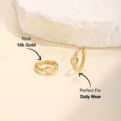 14k gold-plated heart opal hoop earrings with zirconia accents, displayed on a soft background.