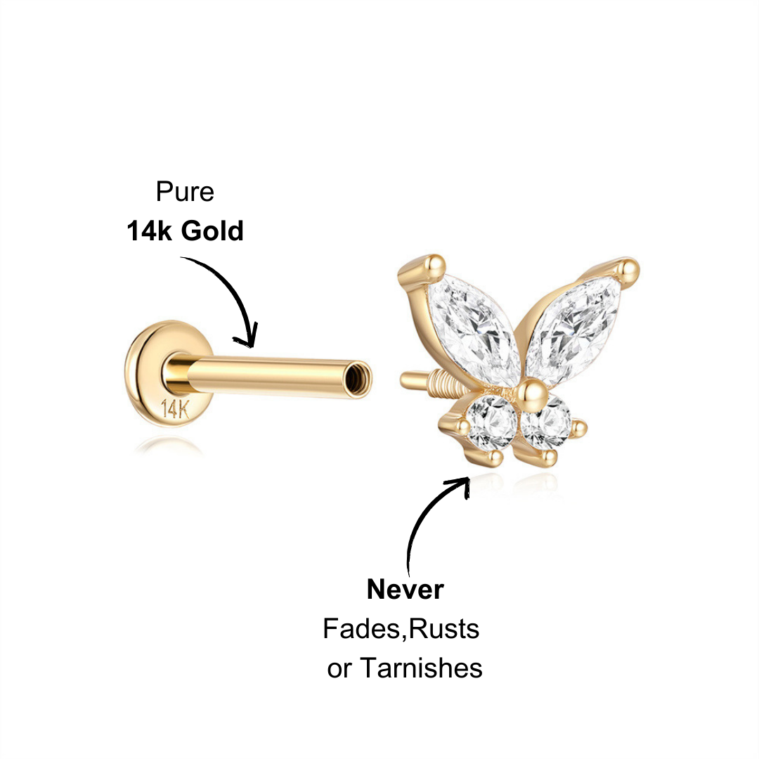 Side angle of the 14K gold butterfly stud earring showcasing its intricate design and sparkling zirconia stones.