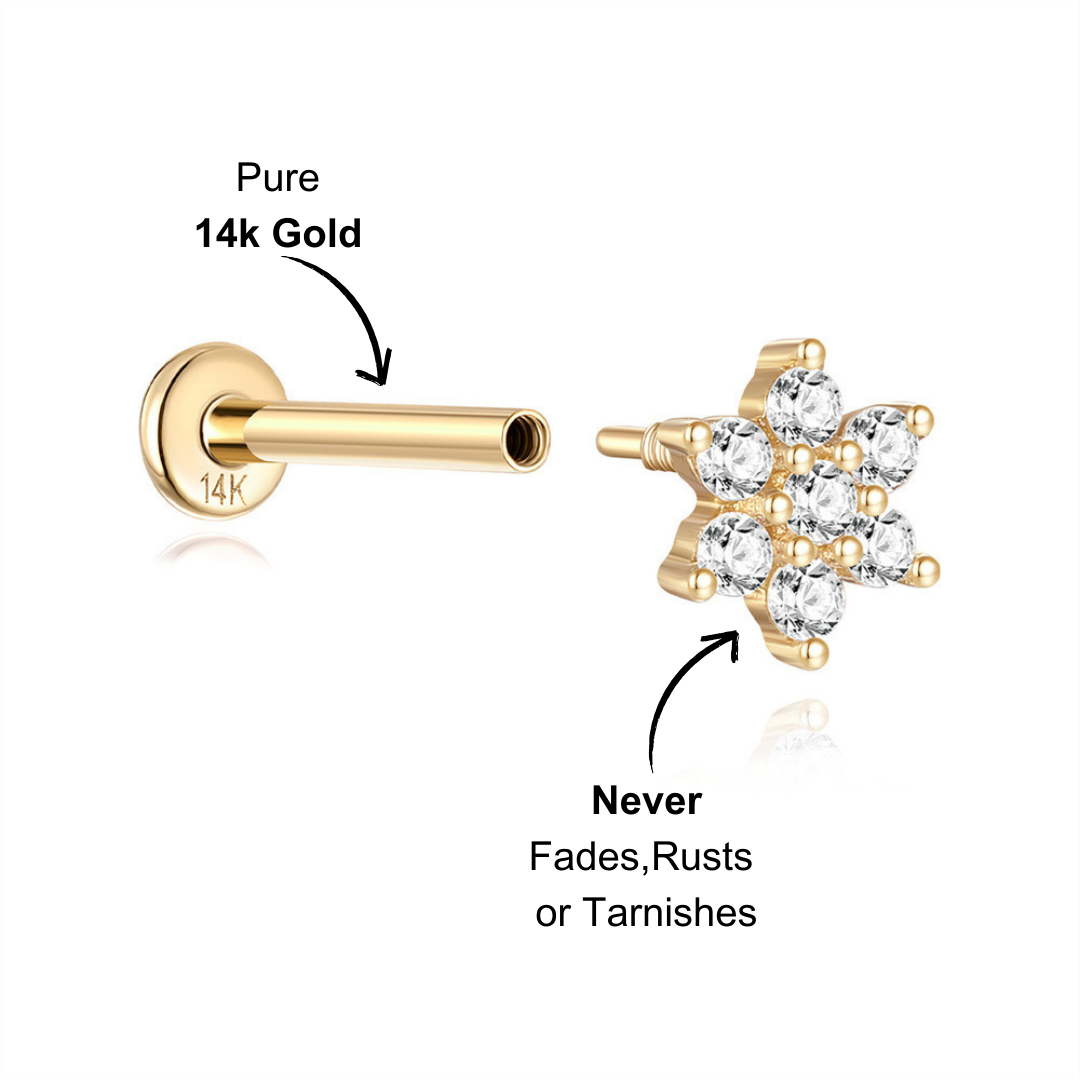 Side view of the 14K gold zirconia flower petal stud earring showcasing the detailed setting and shiny stones.