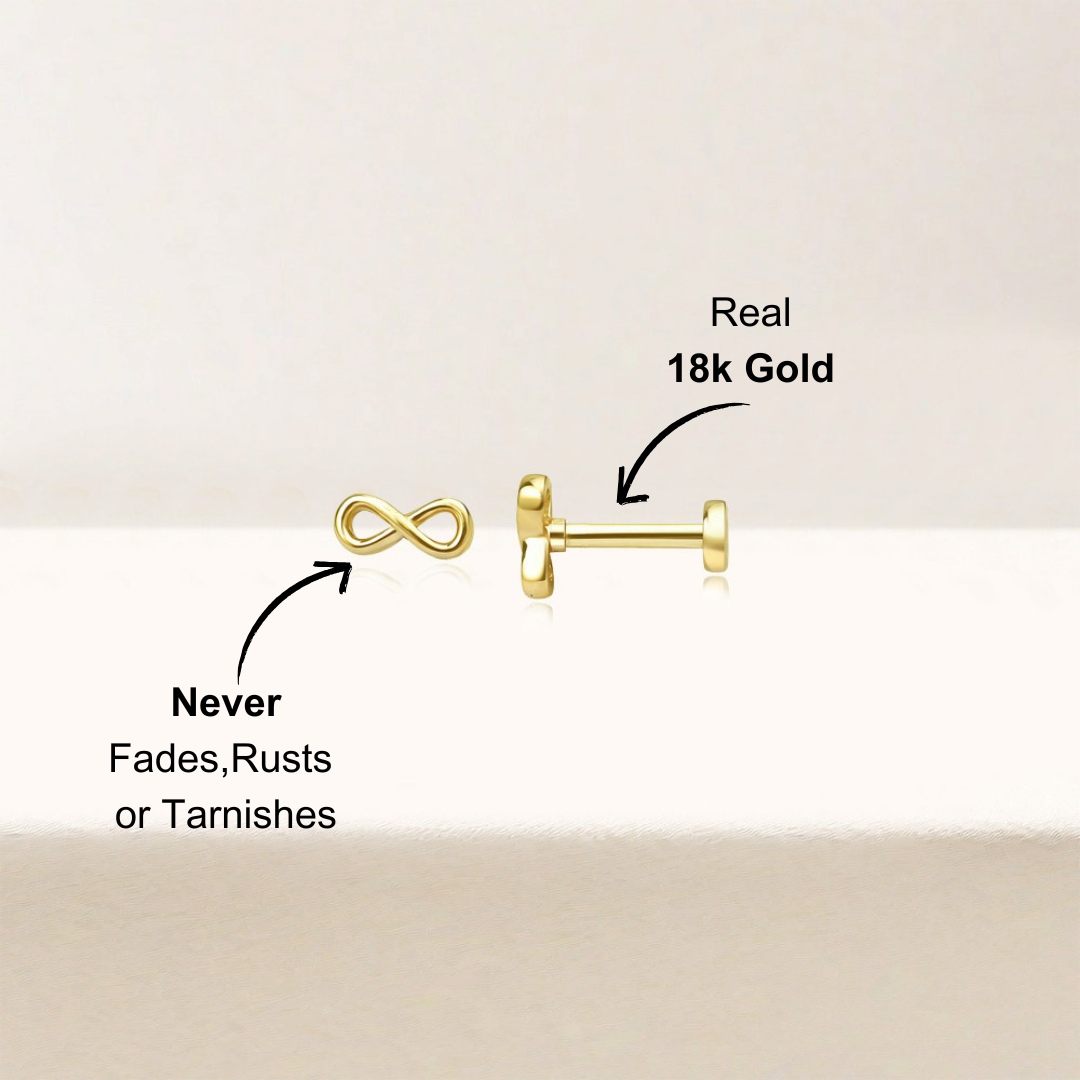 Side view of 14k gold-plated infinity stud earrings, highlighting the smooth finish and clear zirconia accents for a timeless design.