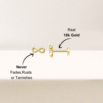 Side view of 14k gold-plated infinity stud earrings, highlighting the smooth finish and clear zirconia accents for a timeless design.