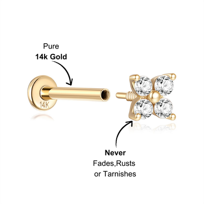 Side view of a 14k gold four-leaf clover zirconia stud earring showing the polished design and secure fastening.