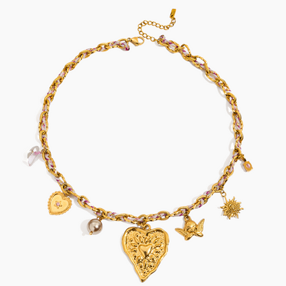 Gold bracelet with various charms on a white background