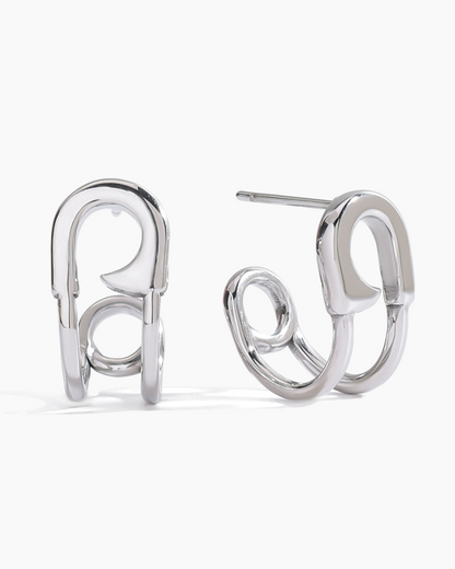 Pair of silver hoop earrings on a white background