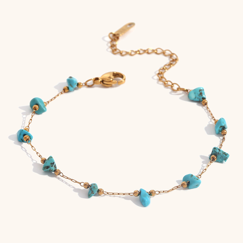 Blue turquoise stone bracelet with boho gold link chain, beach-ready style
