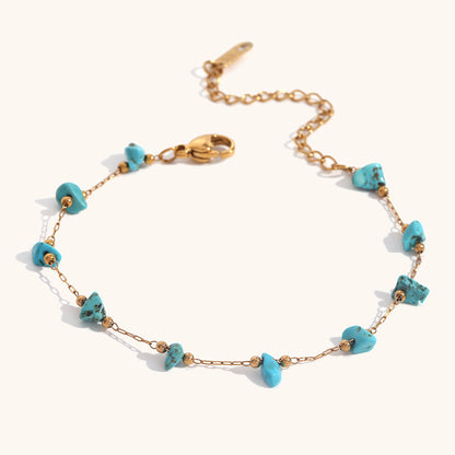 Blue turquoise stone bracelet with boho gold link chain, beach-ready style