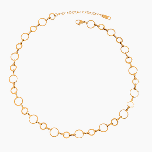 Gold chain necklace on a white background