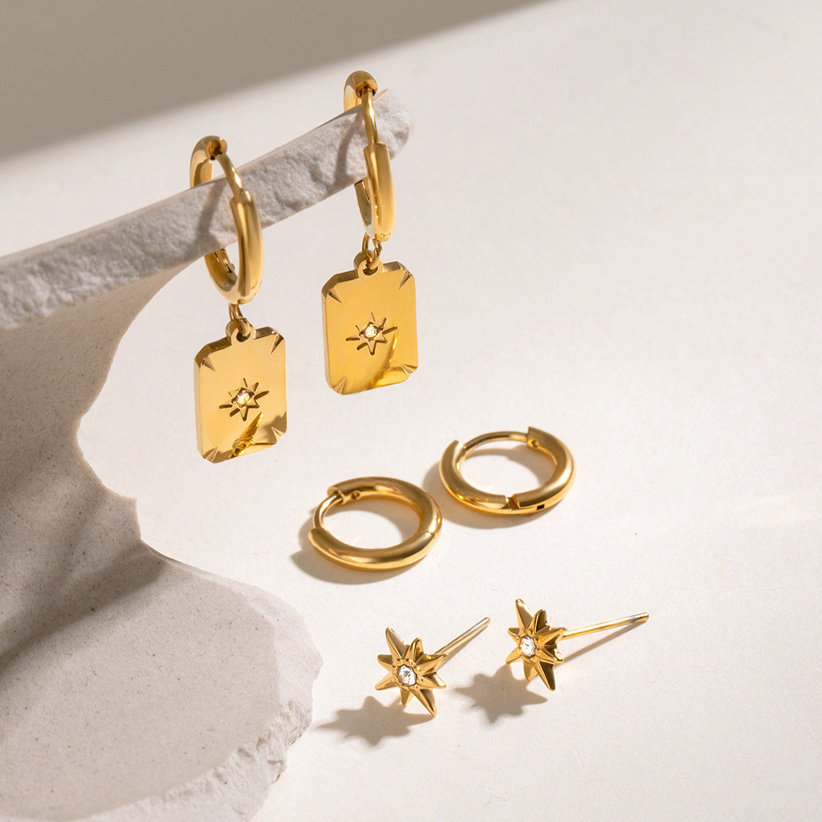 Celestial Dawn – Star-Inspired Gold Earring Trio