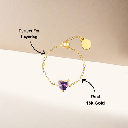 925 sterling silver adjustable band ring featuring a purple heart-shaped zirconia stone.
