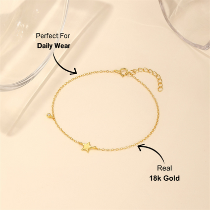 925 sterling silver bracelet with a star charm displayed on a soft, neutral background.