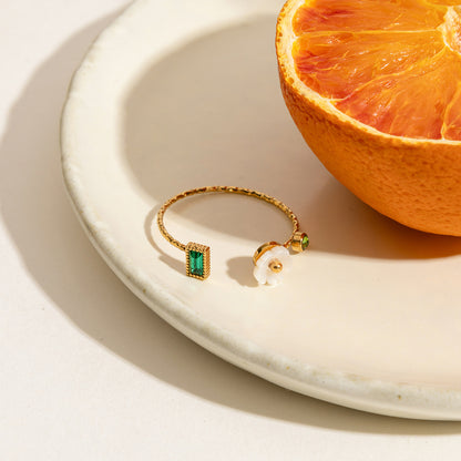 Summer rings styled with orange slice and natural light