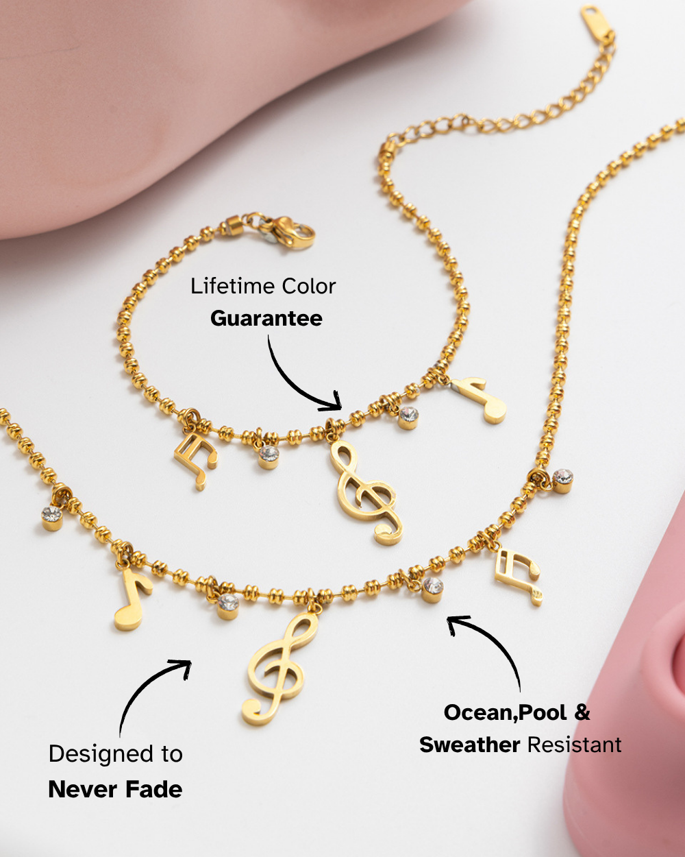 Gold necklace with musical note charms on a light background
