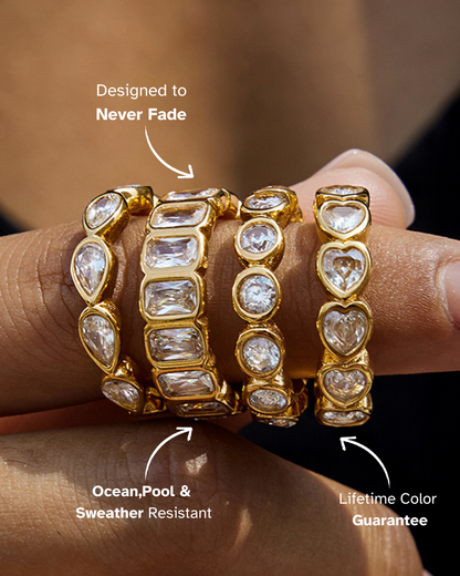Gold and diamond-encrusted bracelets on a wrist with text highlighting features.