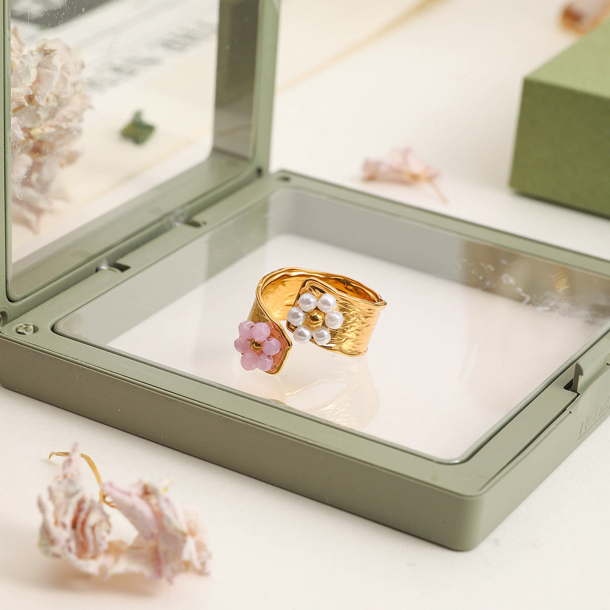 High-shine hammered open ring with beaded flowers in white and pink