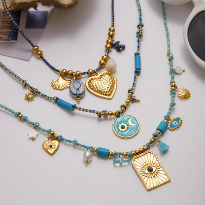 Statement necklace with ocean-inspired charms and elegant textures