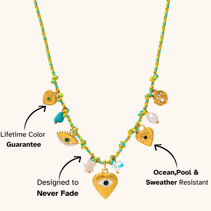 Summer waterproof necklace styled with layered gold chains