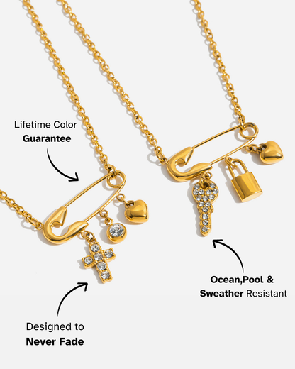 Gold necklace with charms on a white background