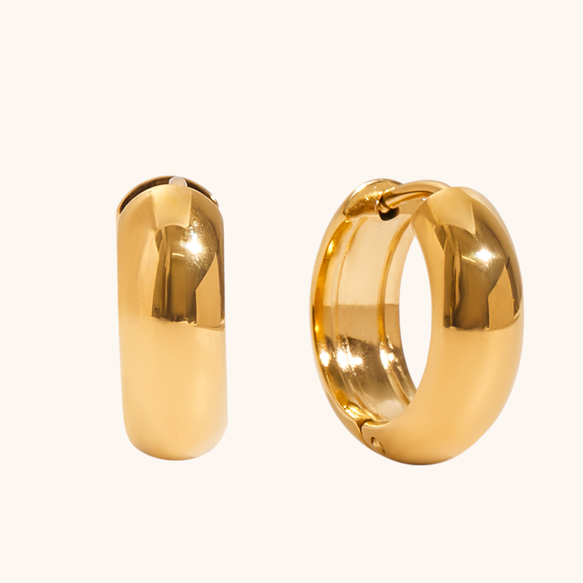 Close-up of waterproof gold hoop earrings