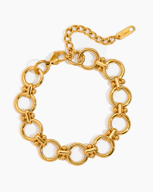 Gold chain bracelet on a white background