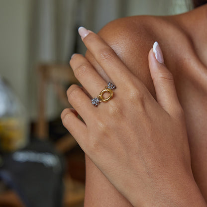 Close-up of mixed metal ring on female hand
