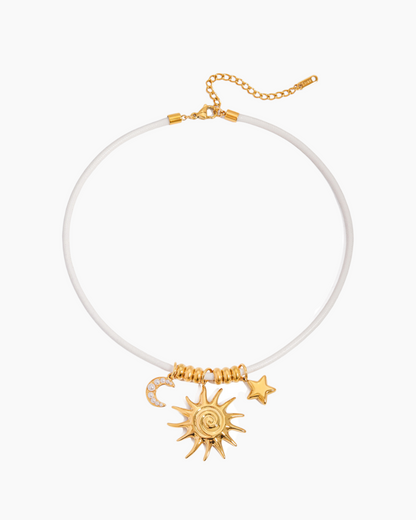 Necklace with sun and star charms on a white background