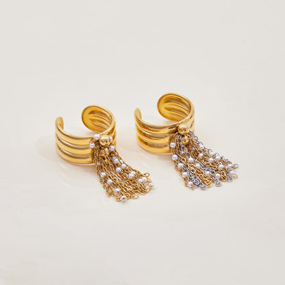Bold gold stacked ring with mixed metal chains and white pearls