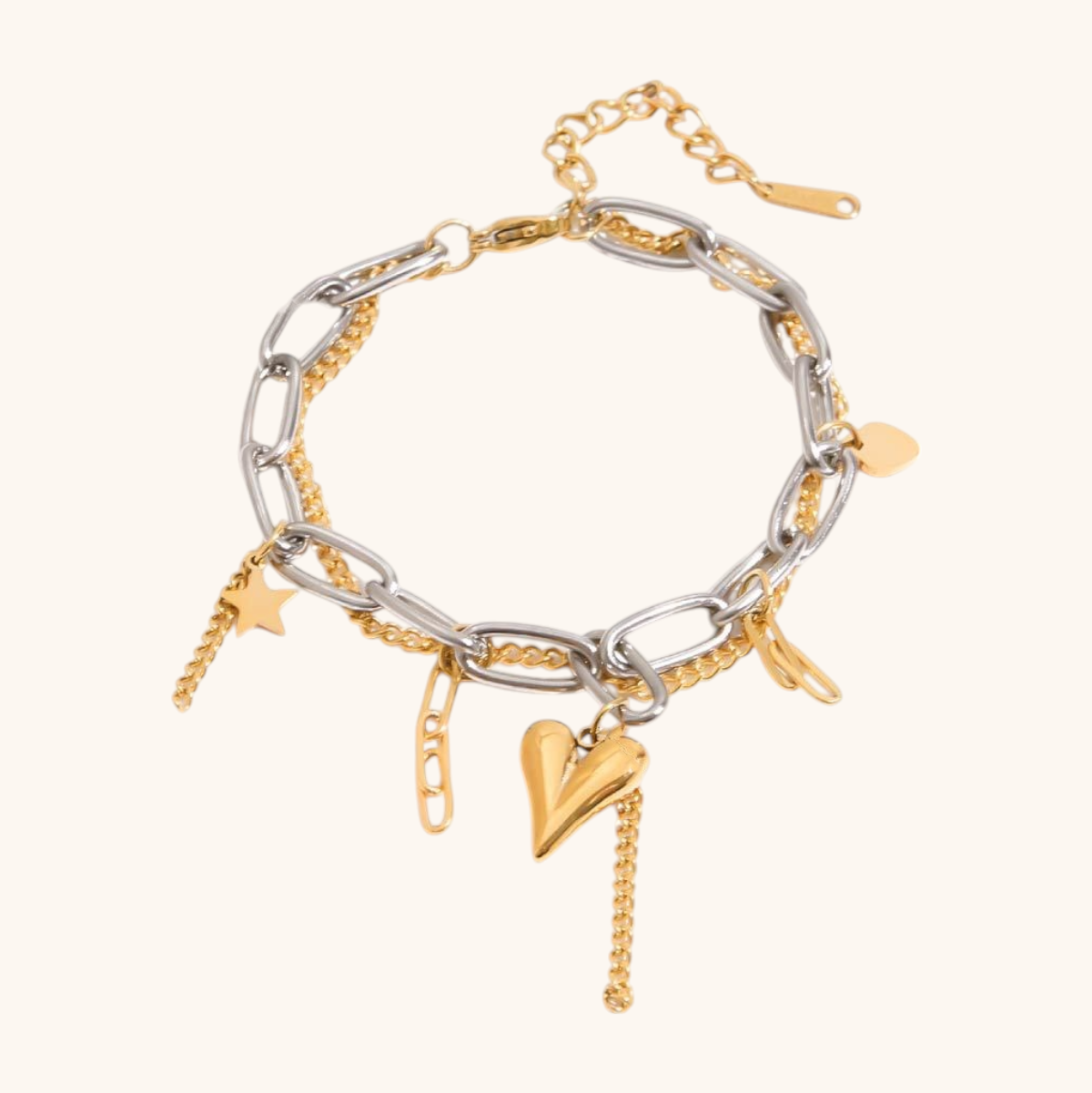 Silver and gold chain bracelet with dangling heart and chain links