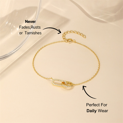 Close-up view of a 925 sterling silver bracelet, showcasing a zircon-studded link and fine chain design.