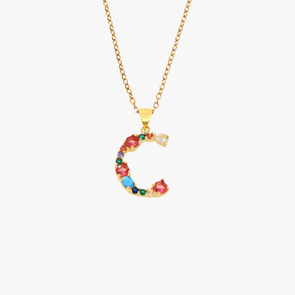 Golden pendant featuring the letter C, embellished with colorful zircon stones in multiple hues on a delicate gold chain.