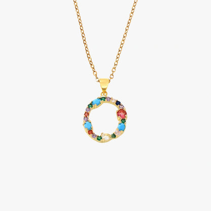 Golden letter O pendant adorned with colorful zircon stones in red, blue, and green on a delicate chain.