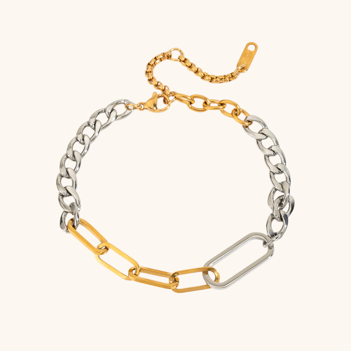 flatlay of two-tone bracelet on minimal background under sunlight