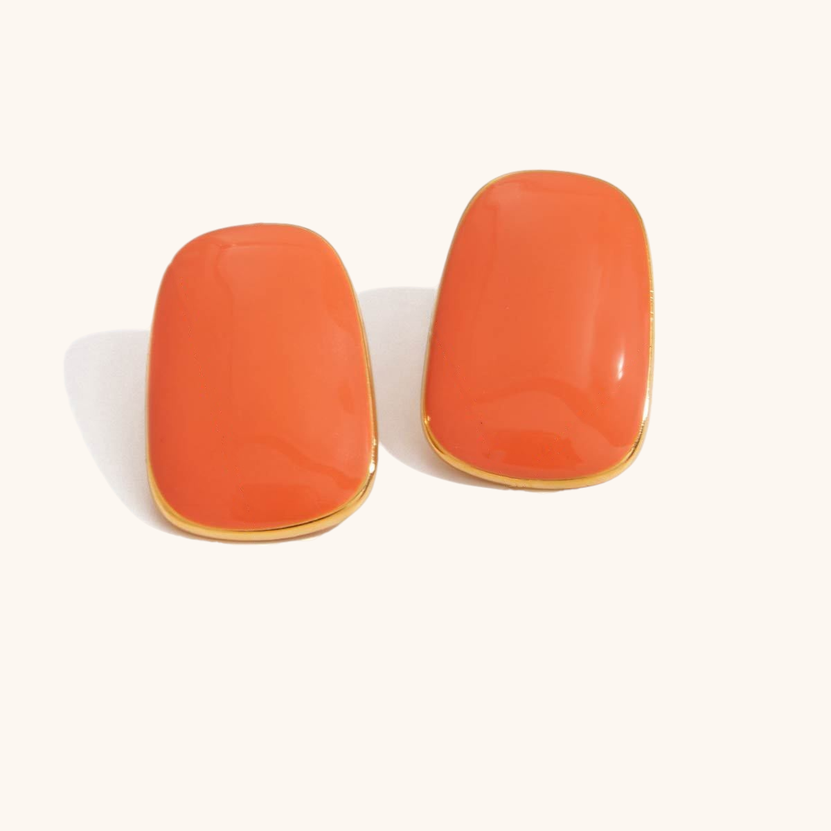 coral red enamel rectangle studs with glossy finish