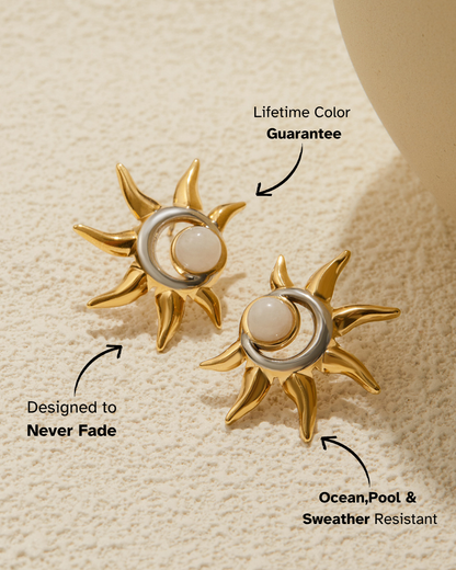 Gold sun-shaped earrings with a central pearl on a beige background, featuring text about product features.